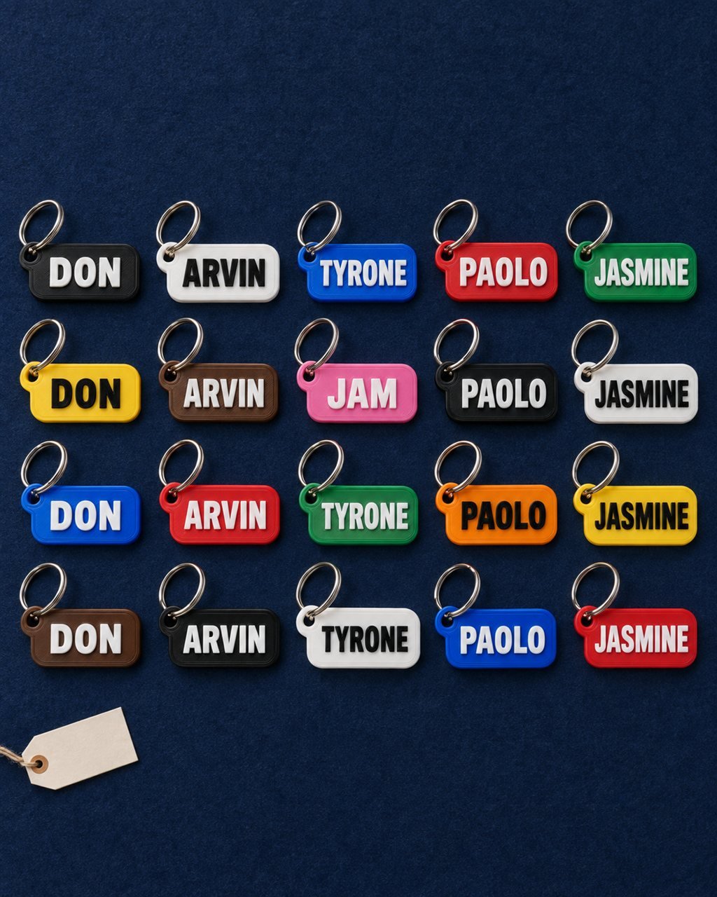 Sample idea: Name keychains for a batch of guests, laid out in rows on a navy board