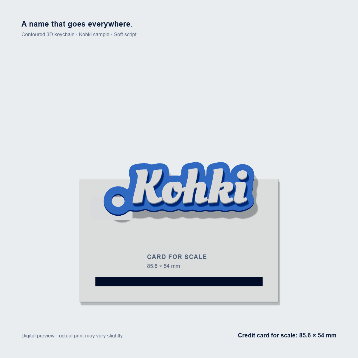 Kohki blue and white 3D name keychain over a credit card for scale